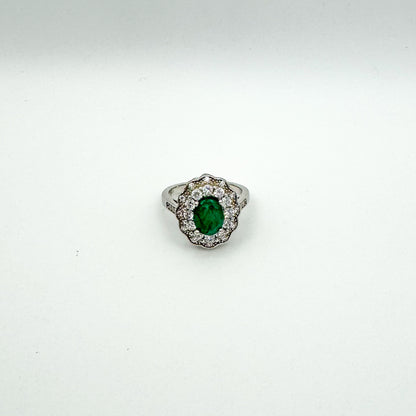 ANELLO CON SMERALDO OVALE E ZIRCONI BIANCHI IN ARGENTO 925 RODIATO