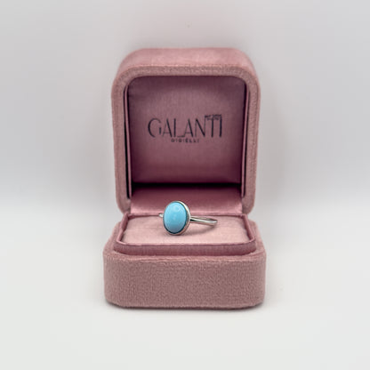ANELLO CON CABOCHON TURCHESE OVALE IN ARGENTO 925 RODIATO - REGOLABILE