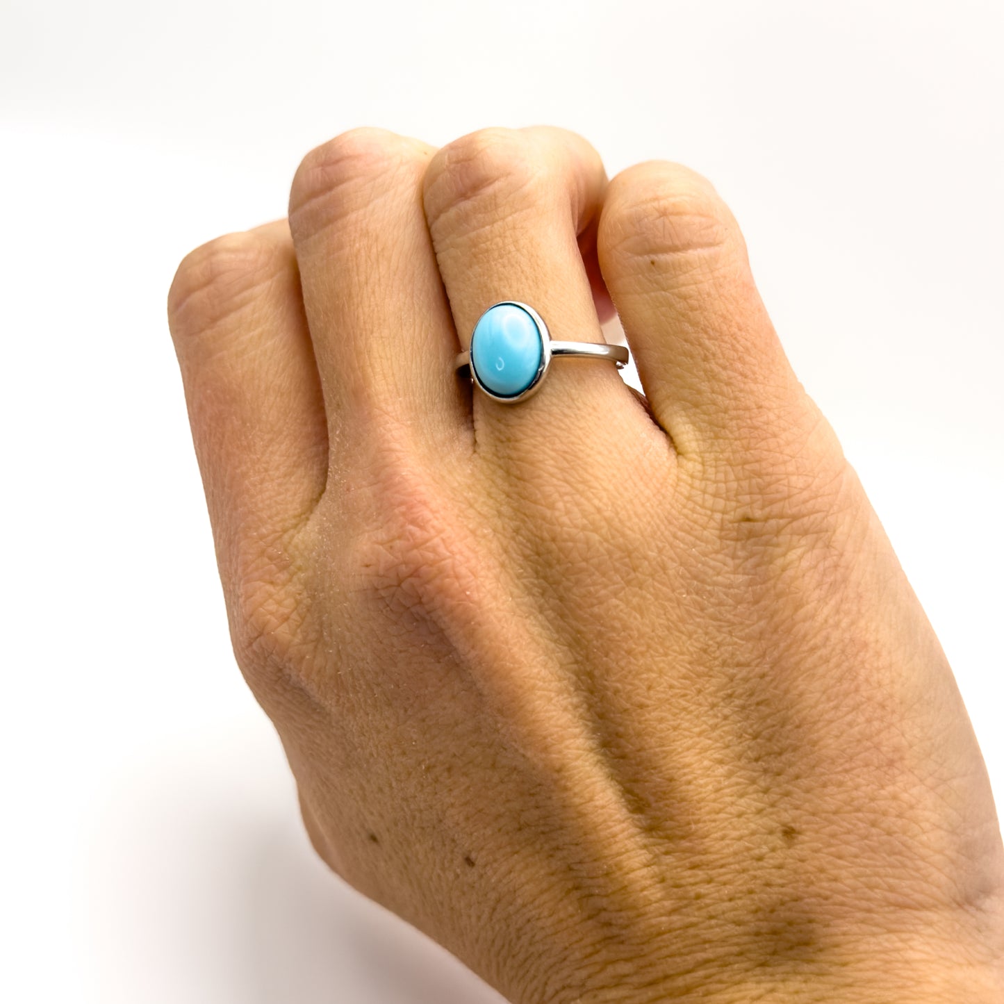 ANELLO CON CABOCHON TURCHESE OVALE IN ARGENTO 925 RODIATO - REGOLABILE